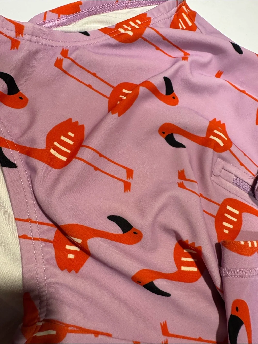 Hanna Andersson long sleeved rash guard flamingo lagoon on primrose